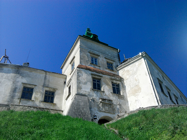 White building against a blue sky as backdrop -- camera phone photos