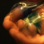 blurred balls on a hand