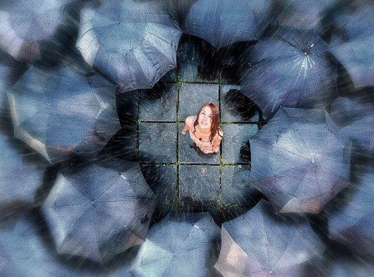 a girl drenched in rain