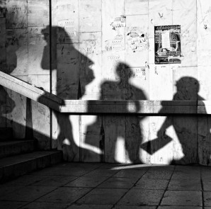 a street photograph with shadows of people -- street photography tips